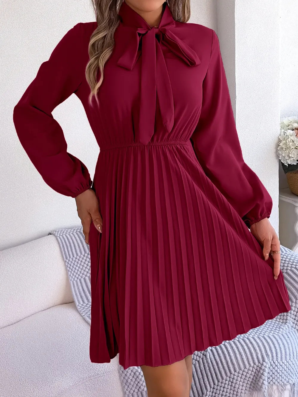 Spring and summer temperament tied waist long sleeved pleated skirt