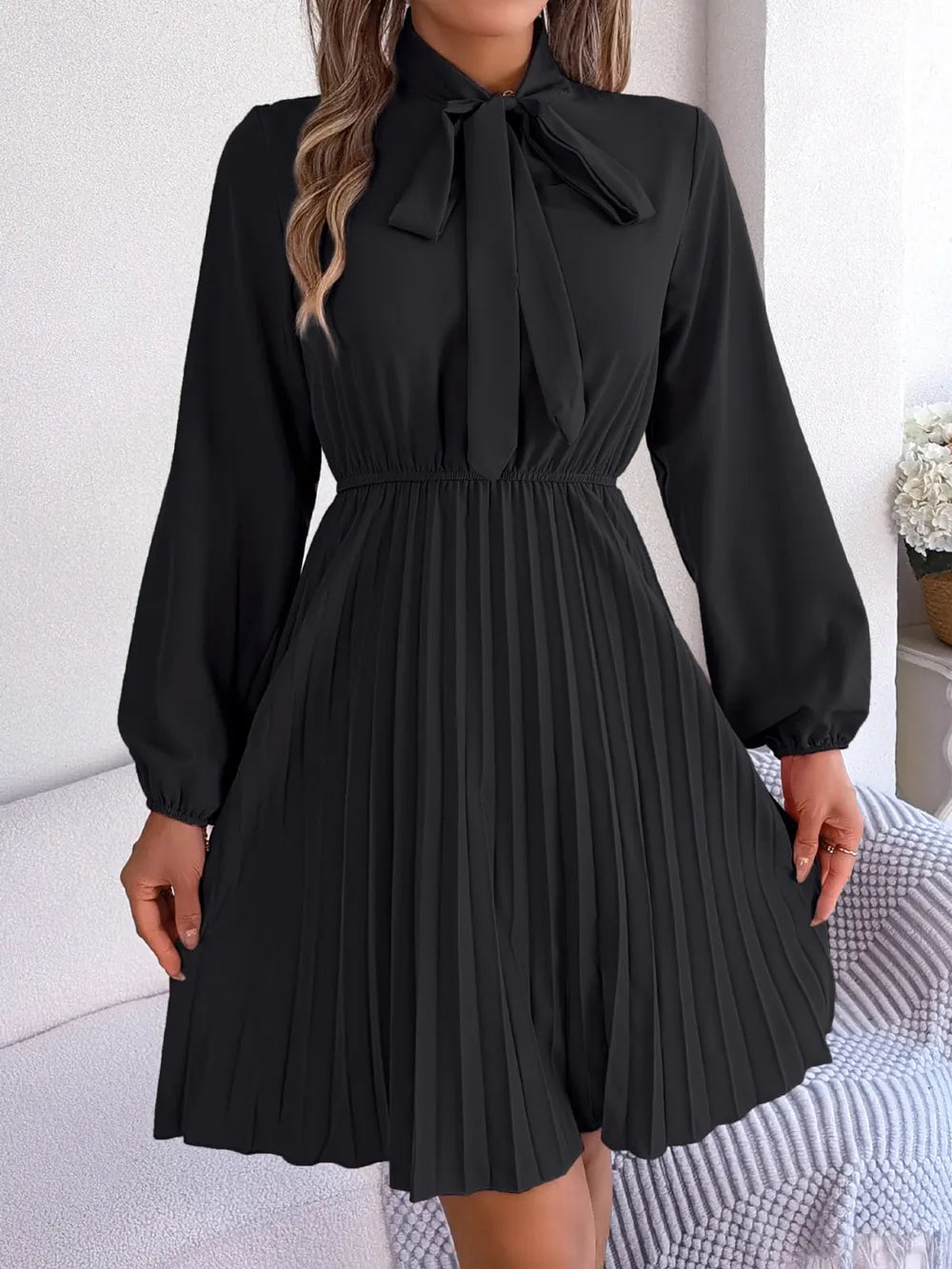 Spring and summer temperament tied waist long sleeved pleated skirt