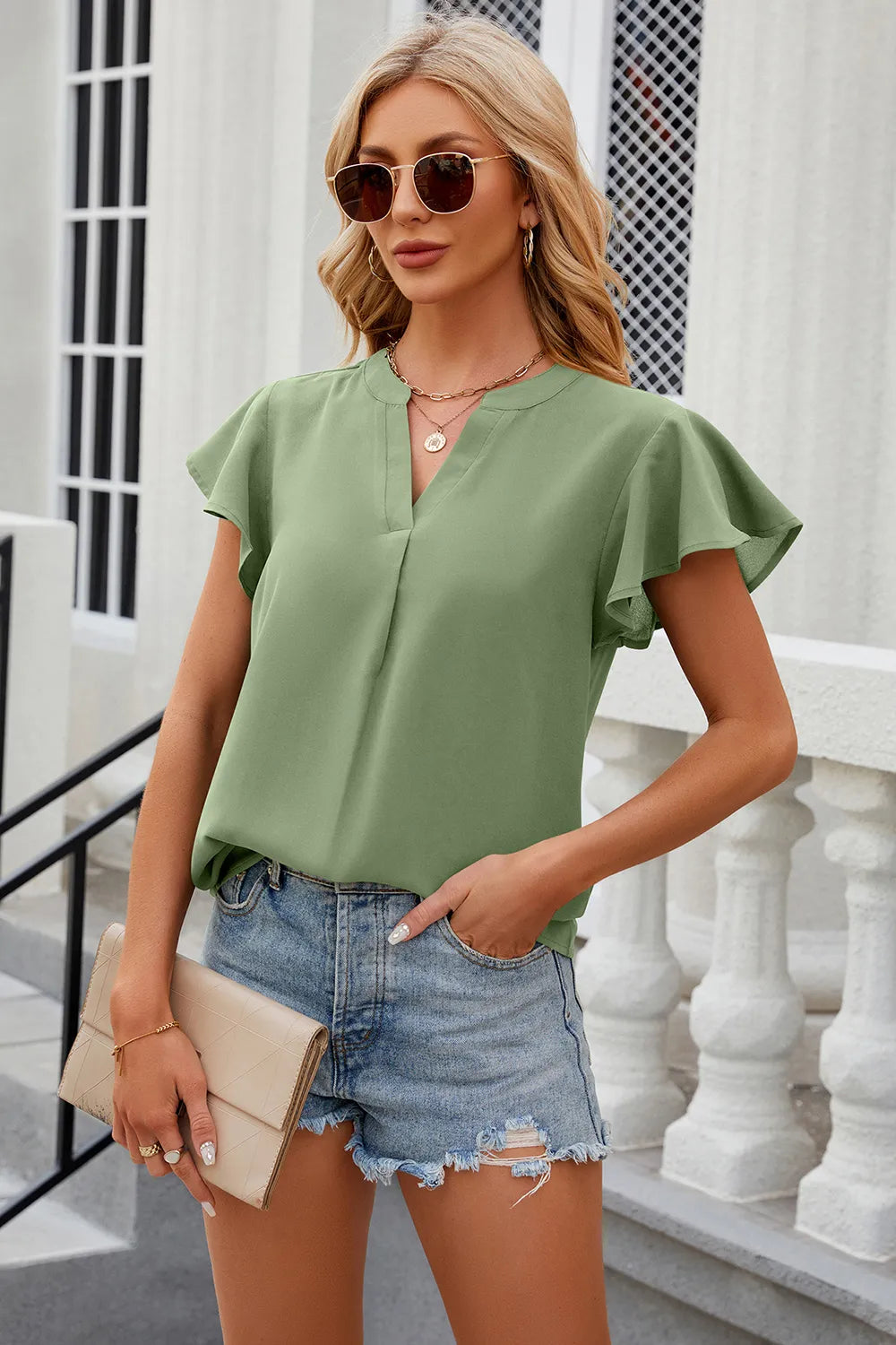 Solid color V-neck loose short sleeved chiffon top for women