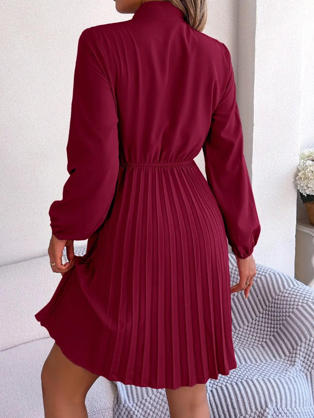 Spring and summer temperament tied waist long sleeved pleated skirt