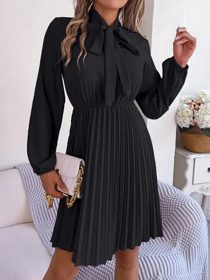 Spring and summer temperament tied waist long sleeved pleated skirt