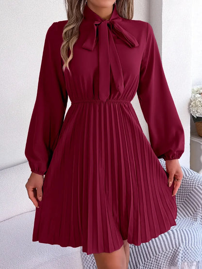 Spring and summer temperament tied waist long sleeved pleated skirt