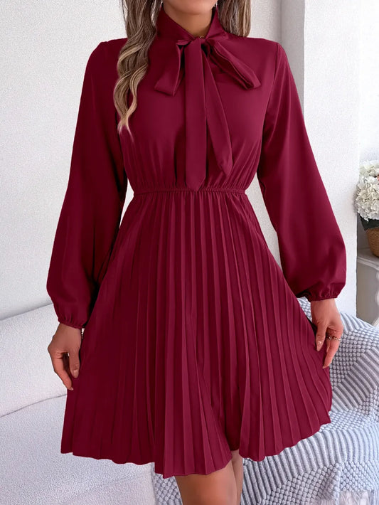 Spring and summer temperament tied waist long sleeved pleated skirt