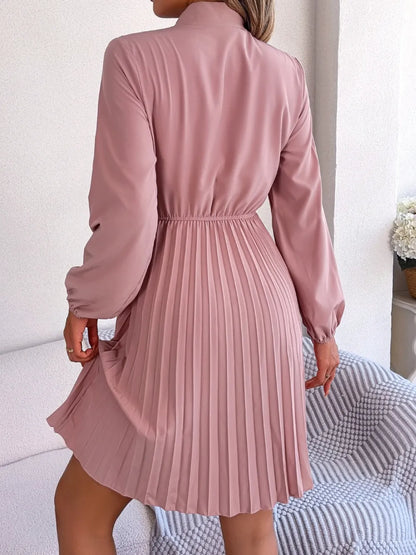 Spring and summer temperament tied waist long sleeved pleated skirt