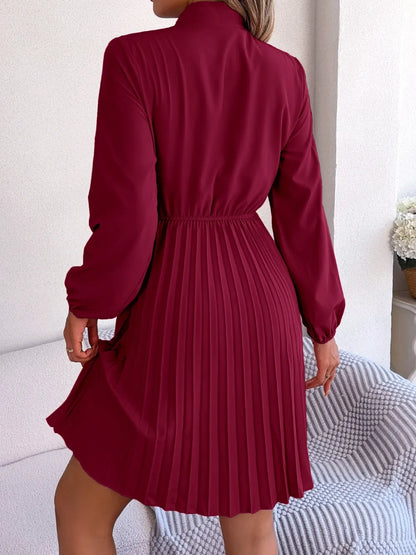 Spring and summer temperament tied waist long sleeved pleated skirt